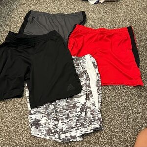 Five pairs of men’s athletic shorts, Adidas and tech gear